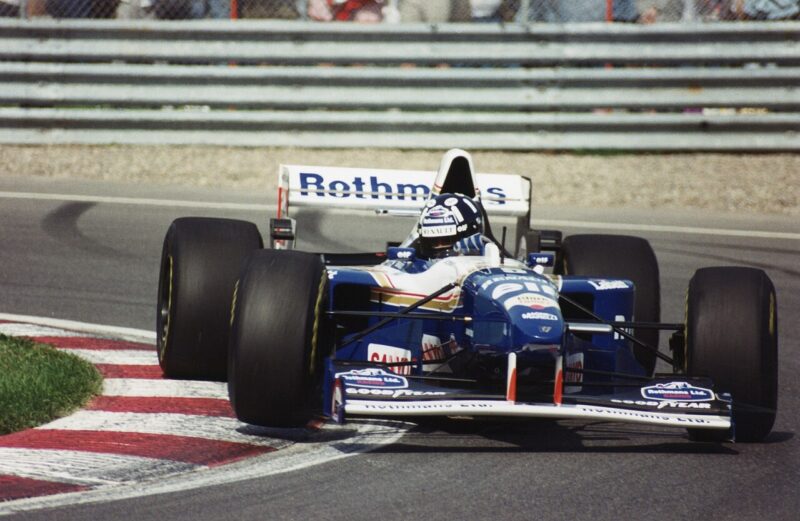 Chronologie Damon Hill : au volant de la Williams FW18 au Grand Prix du Canada, à Montréal, en 1995.